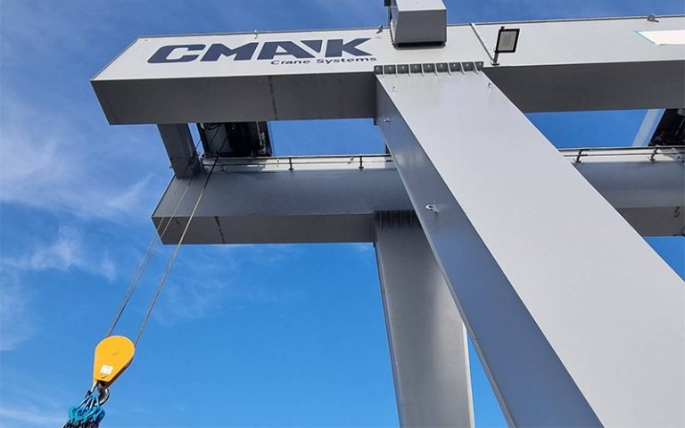 cmak-gantry-crane-system-against-blue-sky